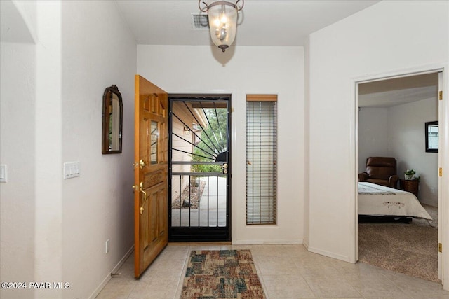 view of tiled entrance foyer