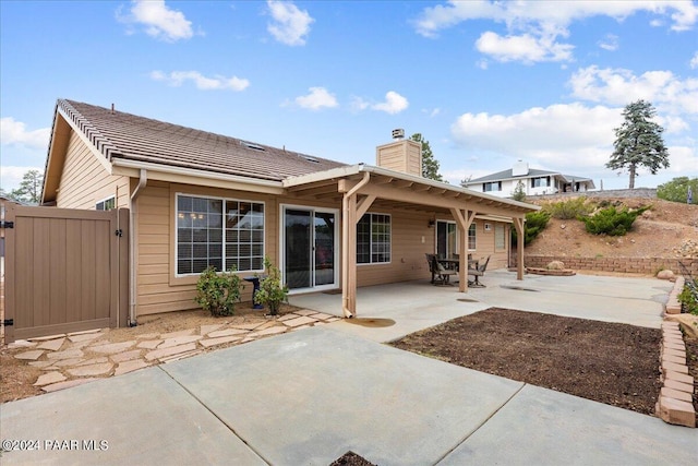 back of house featuring a patio area