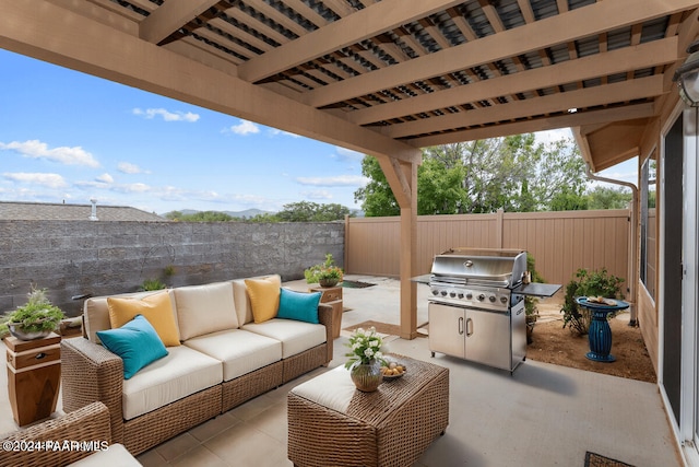 view of patio featuring outdoor lounge area and a grill