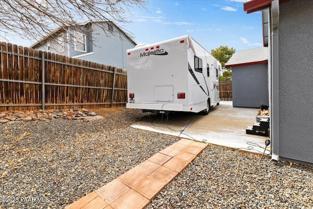 view of property exterior with fence