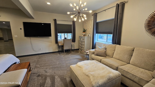 living room with a chandelier and dark carpet