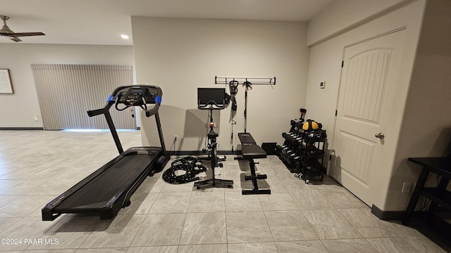 exercise room with ceiling fan