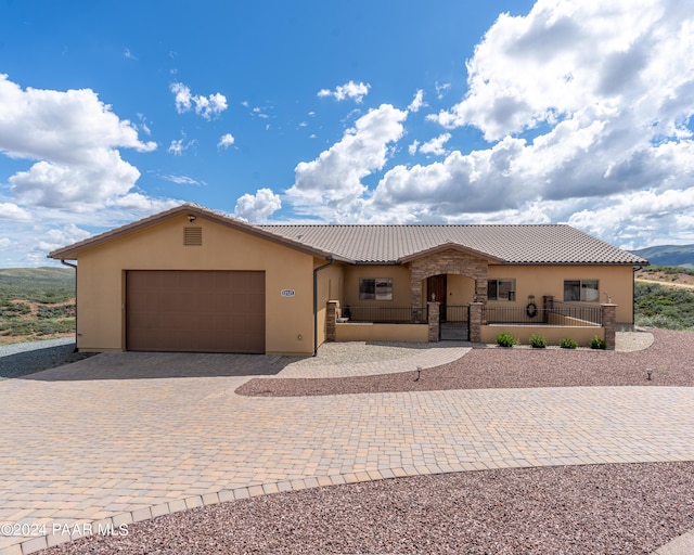 view of front of home featuring a garage