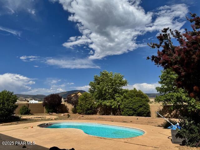 8183 N Blessing Ln, Prescott Valley, AZ 86315 - swimming pool with a fenced backyard and a patio