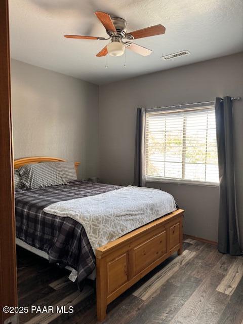 8183 N Blessing Ln, Prescott Valley, AZ 86315 - bedroom featuring wood finished floors and ceiling fan