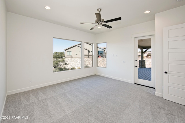 6267 W Omar Rd, Prescott, AZ 86305 - spare room featuring carpet, recessed lighting, a healthy amount of sunlight, and baseboards
