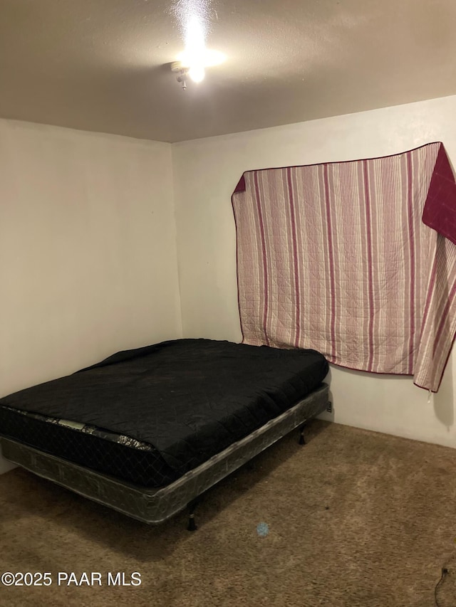 carpeted bedroom with pool table