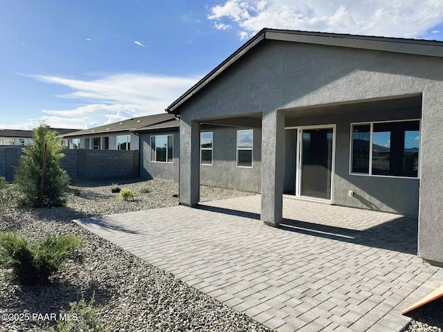 7639 E Louie Ln, Prescott Valley, AZ 86315 - back of property featuring stucco siding and a patio area