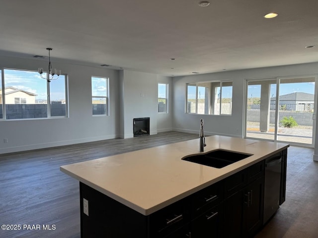 7639 E Louie Ln, Prescott Valley, AZ 86315 - kitchen with open floor plan, dishwasher, dark wood finished floors, light countertops, and recessed lighting