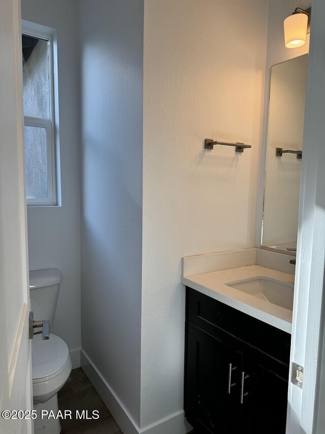 7639 E Louie Ln, Prescott Valley, AZ 86315 - half bathroom featuring vanity and baseboards