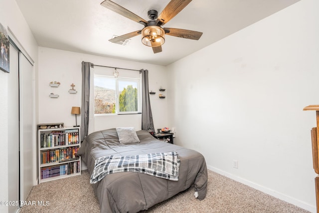 3141 N Prescott E Hwy, Prescott Valley, AZ 86314 - carpeted bedroom featuring a closet, baseboards, and ceiling fan
