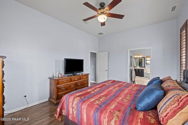 bedroom featuring visible vents, a ceiling fan, baseboards, and wood finished floors