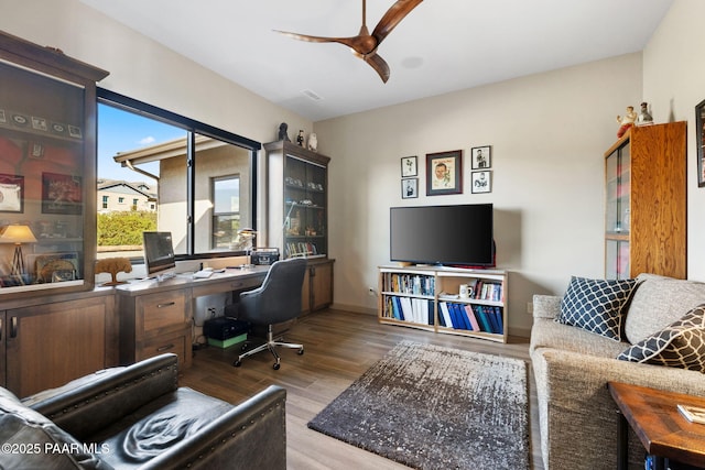 office space with ceiling fan and wood-type flooring