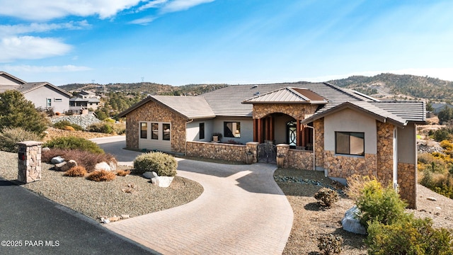 ranch-style house with a mountain view