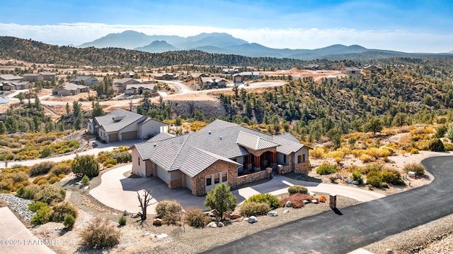 bird's eye view with a mountain view