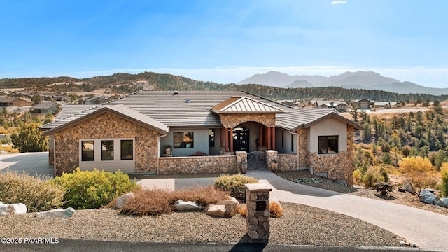 single story home with a mountain view