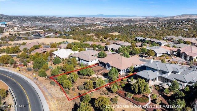 aerial view featuring a mountain view