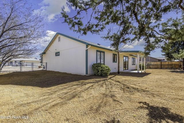 back of property with a patio area