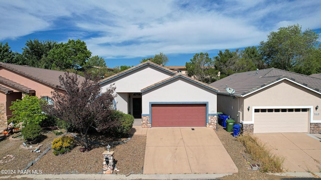 ranch-style home with a garage