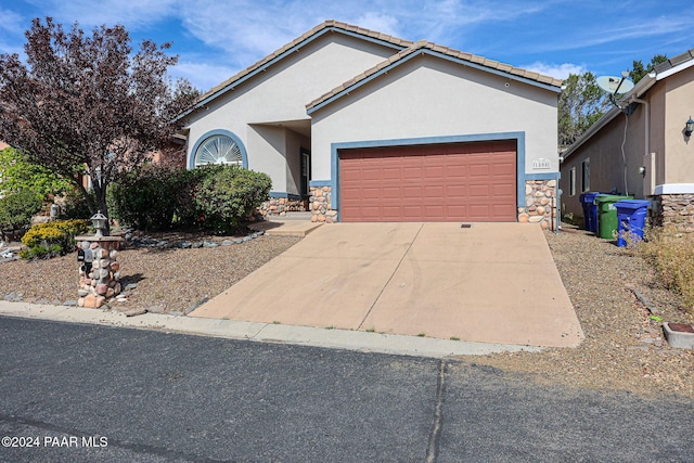 view of front of home featuring a garage