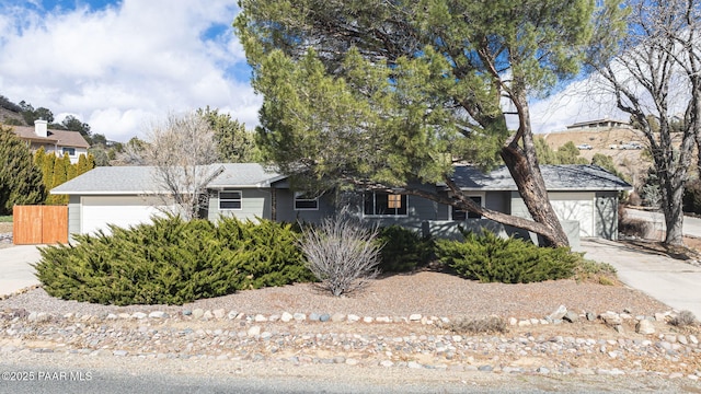 view of front of property with a garage and driveway