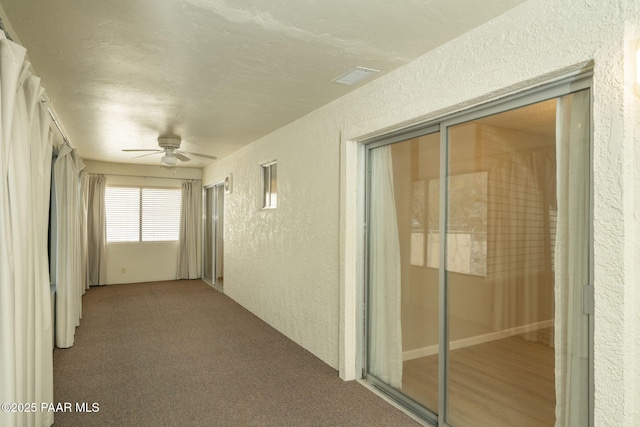 unfurnished sunroom featuring visible vents