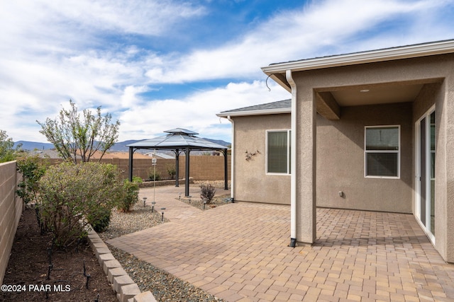 view of patio featuring a gazebo