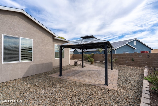 view of yard featuring a gazebo and a patio