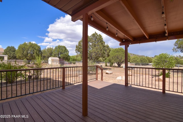 3035 Hozoni Rd, Prescott, AZ 86305 - wooden terrace with a fenced backyard and view of wooded area