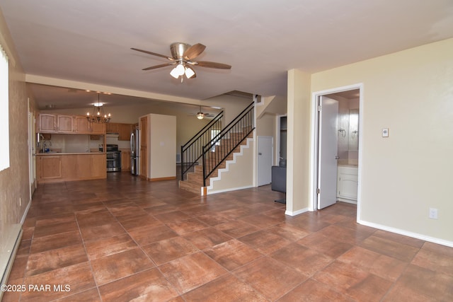 3035 Hozoni Rd, Prescott, AZ 86305 - unfurnished living room with ceiling fan, stairs, and a chandelier