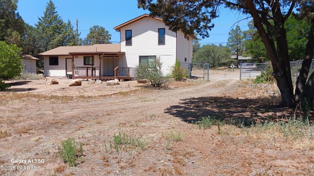 3035 Hozoni Rd, Prescott, AZ 86305 - rear view of property with a porch