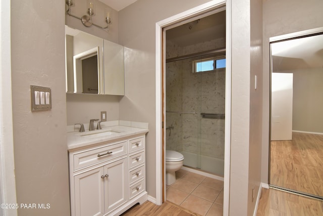3035 Hozoni Rd, Prescott, AZ 86305 - full bathroom with vanity, a shower stall, and wood finished floors