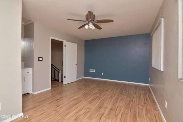 3035 Hozoni Rd, Prescott, AZ 86305 - spare room with a ceiling fan and light wood-style flooring