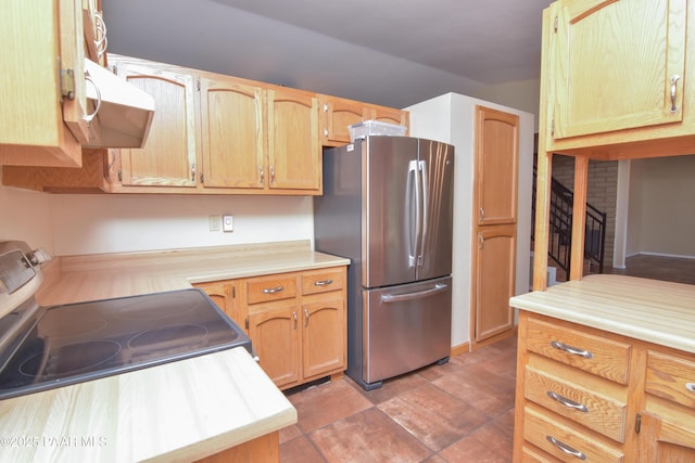 3035 Hozoni Rd, Prescott, AZ 86305 - kitchen with stainless steel appliances, exhaust hood, and light countertops