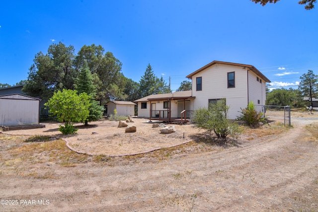 3035 Hozoni Rd, Prescott, AZ 86305 - rear view of property with a storage unit