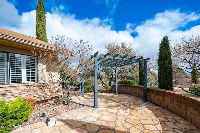 view of patio / terrace featuring a pergola