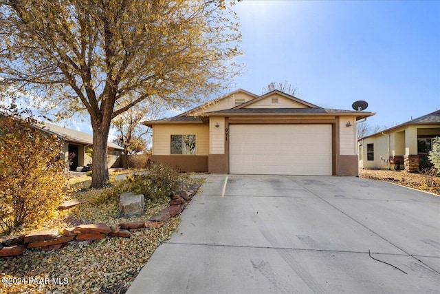 ranch-style home with a garage