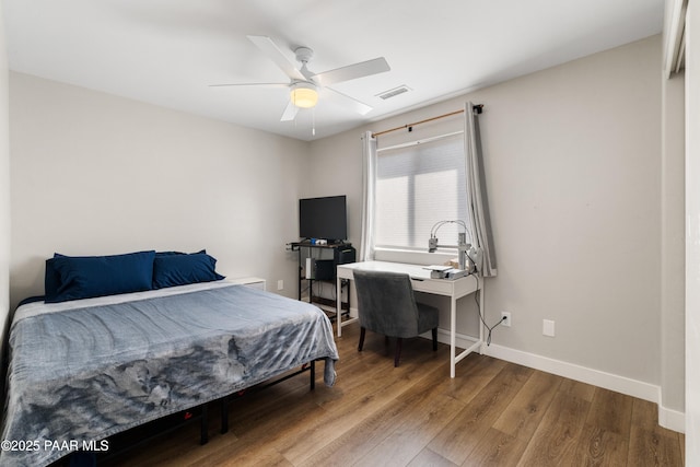 4714 N Sheridan Ln, Prescott Valley, AZ 86314 - bedroom featuring wood finished floors, baseboards, and ceiling fan