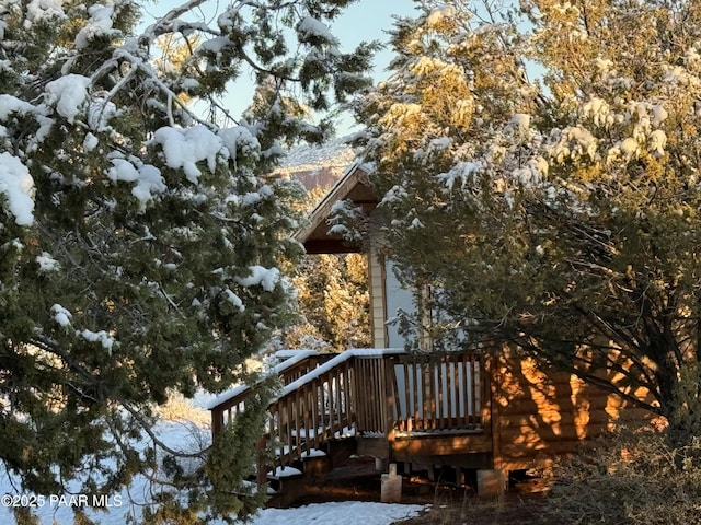 view of snow covered deck