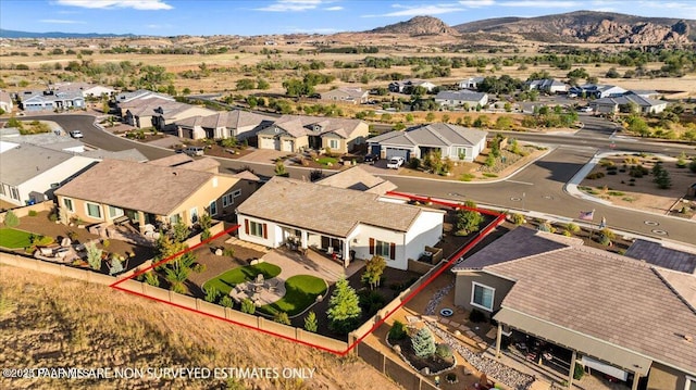 drone / aerial view featuring a mountain view