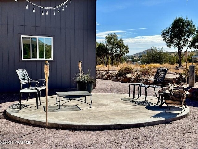 view of patio with a mountain view