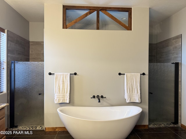 bathroom featuring vanity, separate shower and tub, and tile patterned floors