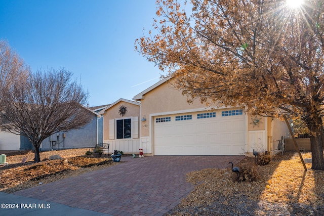 view of front of home with a garage