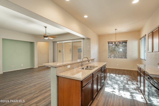 kitchen featuring decorative light fixtures, dark hardwood / wood-style flooring, sink, and ceiling fan with notable chandelier