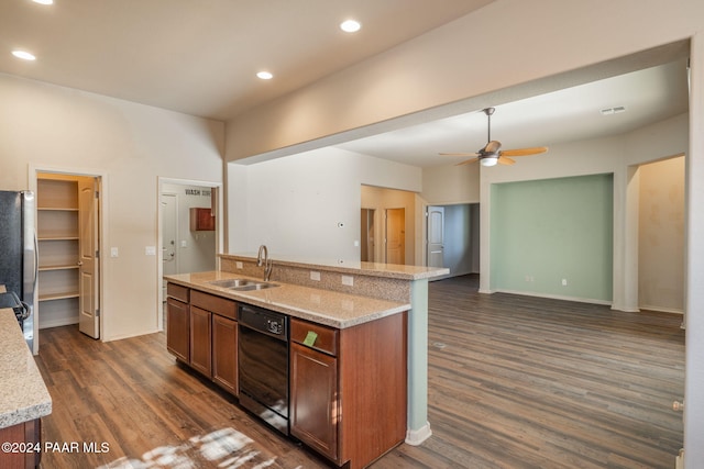 kitchen featuring stainless steel refrigerator, dishwasher, sink, dark hardwood / wood-style floors, and an island with sink