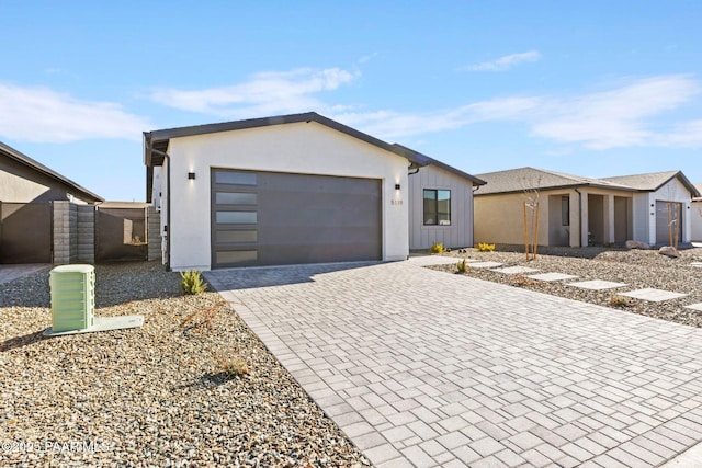 view of front of property featuring a garage