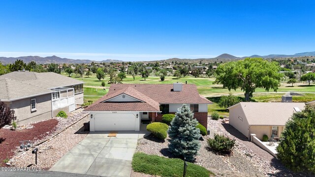 1107 N Buena Vista E, Dewey-Humboldt, AZ 86327 - ranch-style home featuring a garage, driveway, a mountain view, and a residential view