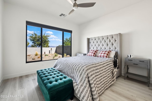 bedroom featuring ceiling fan and light wood-type flooring