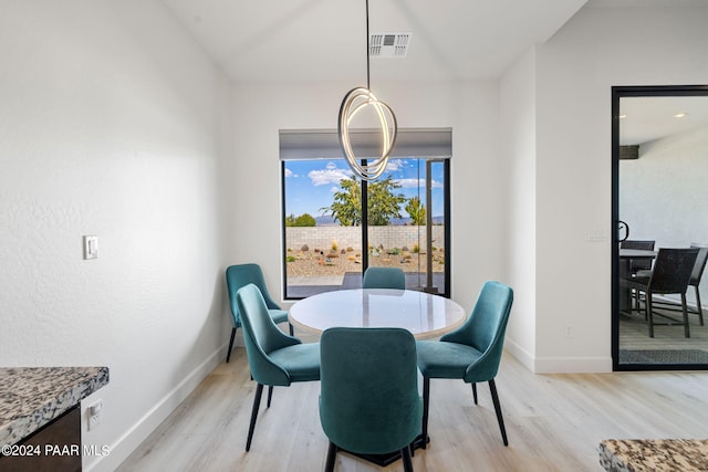 dining room with light wood-type flooring