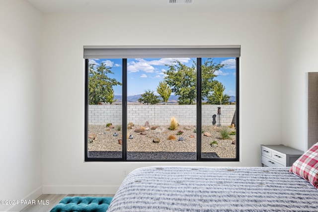 bedroom featuring wood-type flooring